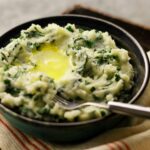 Colcannon Mashed Potatoes are not only delicious but the green color captures the spirit of its Irish heritage.