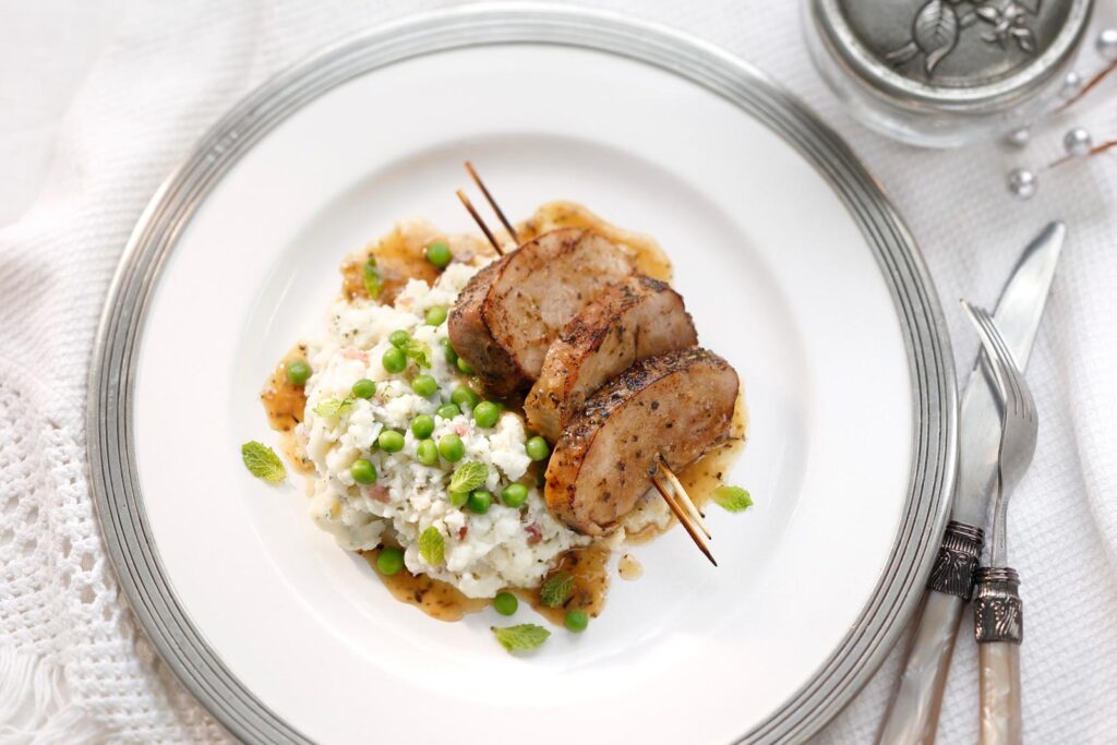 Chevre Mashed Potatoes with Peas and Grilled Pork Tenderloin