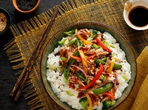 This Asian Mashed Potato Bowl recipe is full of colorful veggies and comes together in a snap with the use of prepared teriyaki sauce and Idahoan Mashed Potatoes.