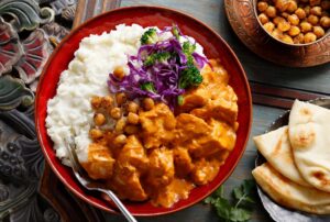 This Indian favorite pairs with Idahoan Mashed Potatoes to make this Butter Chicken Mashed Potato Bowl.