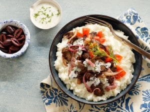 This Greek Mashed Potato Bowl is made with lamb, kalamata olives, sautéed onions, fresh diced tomatoes and, of course, Idahoan mashed potatoes!