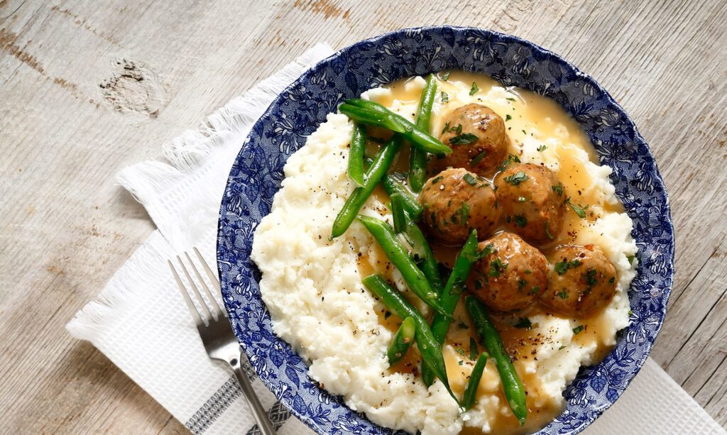 Swedish meatballs with gravy are the perfect Mashed Potato Bowl!