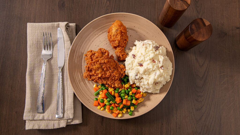 Idahoan Baby Reds Mashed Potatoes with fried chicken and mixed veggies