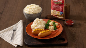 Idahoan Buttery Homestyle Mashed Potatoes with corndogs and mixed veggies